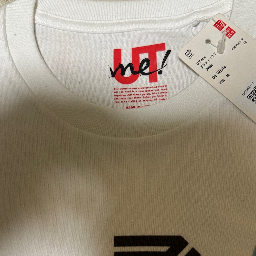 Uniqlo White Tee with Bold Black Graphic